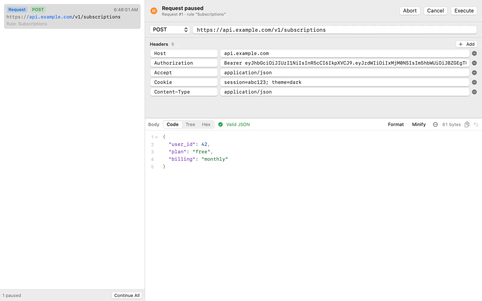 The Breakpoint window with a paused request ready to edit, execute, cancel or abort